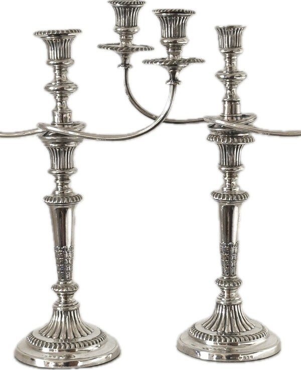Pair of Regency Silver Candlesticks, Sheffield 1816, with matching silver plate 3-branch candelabra extensions.
